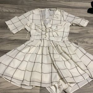 White and black low cut romper